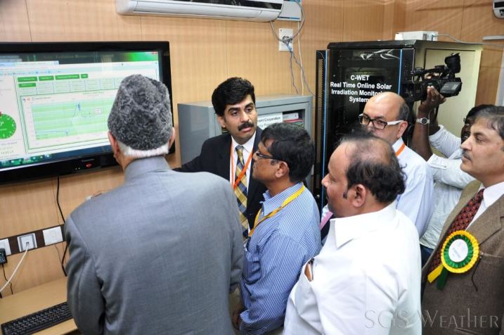 Vipin Gandhi MD SGS Weather explaining solar data to the Hon. minister